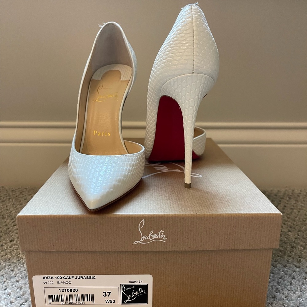 Louboutin. Never worn. Brand new